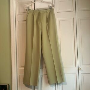 matcha green pleated wide-leg trousers front pleats and belt loops.